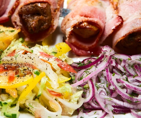 barbecue with sauce and vegetablesの写真素材