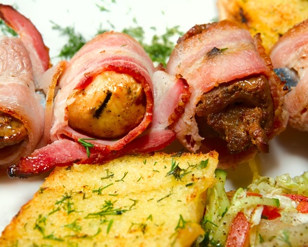 barbecue with sauce and vegetablesの写真素材