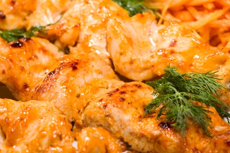 barbecue with sauce and vegetablesの写真素材