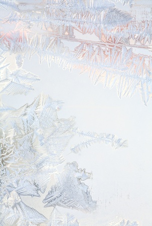 Frosty natural pattern on winter windowの写真素材
