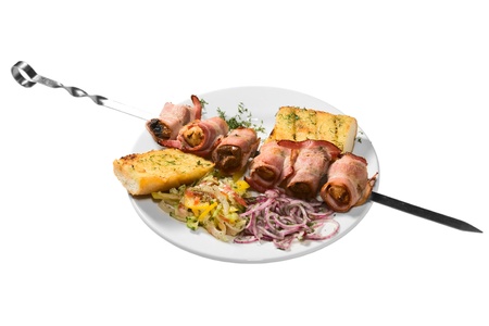 barbecue with sauce and vegetablesの写真素材