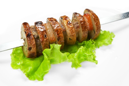 barbecue with sauce and vegetablesの写真素材