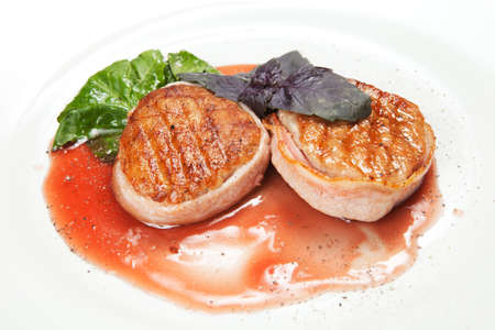 barbecue with sauce and vegetablesの写真素材