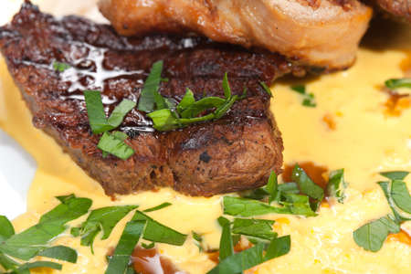 Gourmet grilled steak on a plateの写真素材