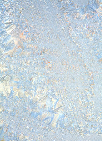 Frosty natural pattern on winter windowの写真素材