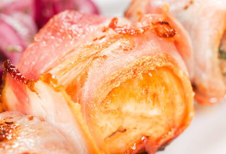 barbecue with sauce and vegetablesの写真素材