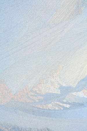 Frosty natural pattern on winter windowの写真素材