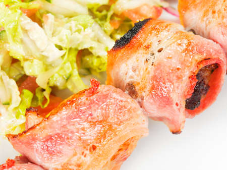 barbecue with sauce and vegetablesの写真素材