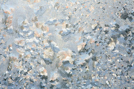 Frosty natural pattern on winter windowの写真素材