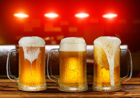 cold light beer glass mug in a pubの写真素材