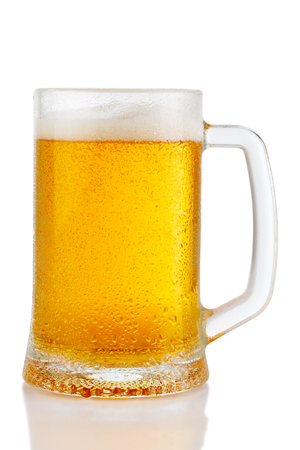 cold mug of beer with foam isolated on white backgroundの写真素材