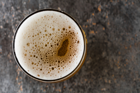 mug with beer on a vintage backgroundの写真素材