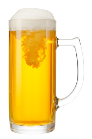 cold mug of beer with foam isolated on white backgroundの写真素材