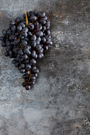 Bunch of grapes on grunge backgroundの写真素材