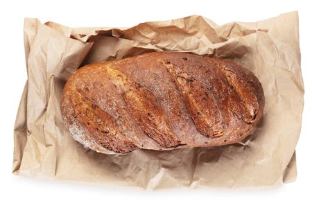 Bread and paper bag isolated on white. Top viewの写真素材