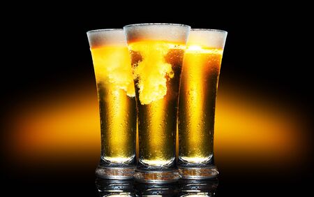 Set Glass of cold craft light beer on dark background.の写真素材