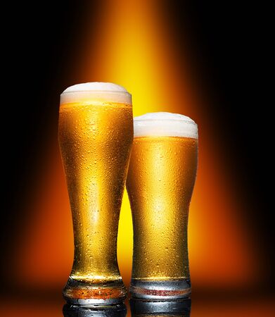 Set Glass of cold craft light beer on dark background.の写真素材