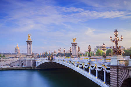 The Grand Palais and Pont Alexandre III Bridge at cloudy dayの写真素材