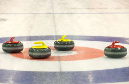 Group of c stones for game in curling on iceの写真素材