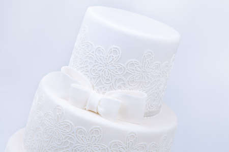 Delicious luxury ping wedding or birthday cake with golden decorationの写真素材