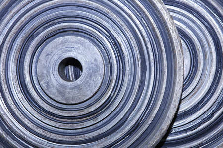 Background of steel plates stacked in warehouse, close upの写真素材