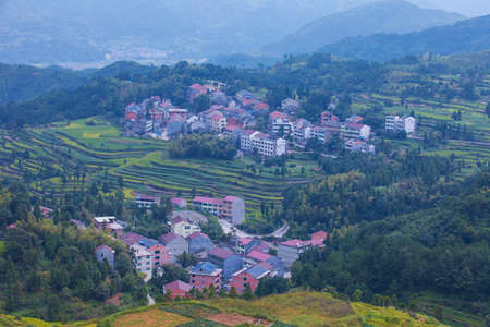 Wilage arroung terraced rice fields, Wenzhou, Chinaの写真素材