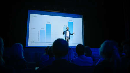 Startup Conference Stage: Speaker Presents New Product, Talks about Performance, Neural Networks, Artificial Intelligence, Big Data and Machine Learning. Live Event with Large Audienceの写真素材