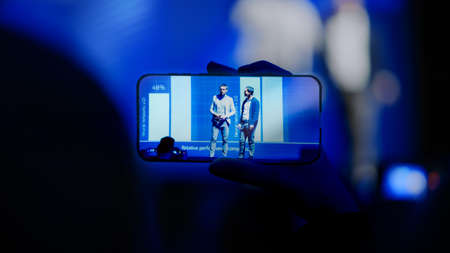 Audience Use Smartphones to Record Two Speakers Talking on Business Conference. Public Uses Mobile...