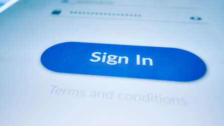 Close-up Macro Shot: Smartphone with Application Authorization Screen asking to Enter Username and Password. Touch Screen Mobile Phone Device with Mock-up Sign in Windowの写真素材