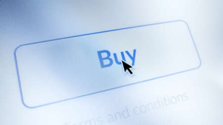 Close-up Macro Shot: Device Screen with Website Showing "Buy" Button, Cursor Clicks on Button. Online Shopping E-commerce Concept. Mock-up Application UI, UX, GUIの写真素材