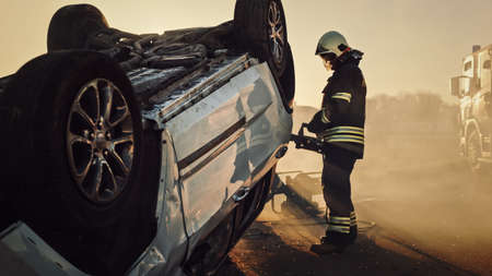On the Car Crash Traffic Accident: Paramedics and Firefighters Rescue Injured Trapped Victims....