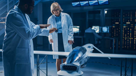 International Team of Aerospace Engineers Work On Unmanned Aerial Vehicle Drone Prototype. Aviation...