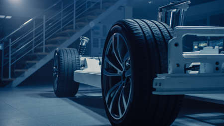 Shot of Automobile Concept: Authentic Electric Car Platform Chassis. Hybrid Frame Include: Wheels,...