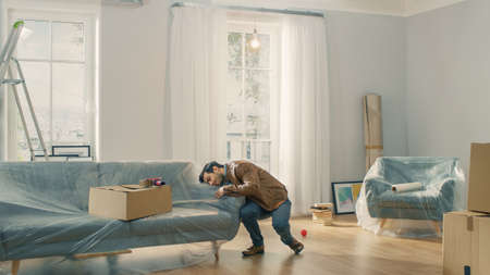 Very Happy Man Moves Into His New Apartment, Dances Excited. Guy Purchased New Home Ready to Start...