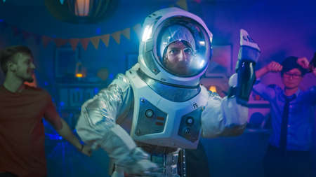 At the College House Costume Party: Fun Guy Wearing Space Suit Dances Off, Doing Robot Dance Modern...