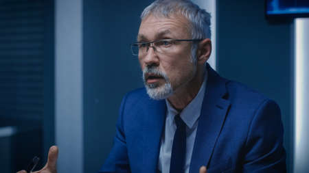 Portrait of the Corporate Businessman having Heated Debate with His Business Partners During Weekly...