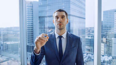 Point of View Shot of the Businessman Using Augmented Reality Touchscreen, Making Gestures. In the...