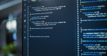 Close Up Focus on Desktop Computer Screen. Digital Display Showing Coding Language User Interface. Software Engineer Programming Innovative e-Commerceの写真素材