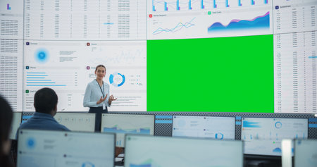 Caucasian Female Data Scientist Giving Presentation On Big Digital Screen With Green Screen...