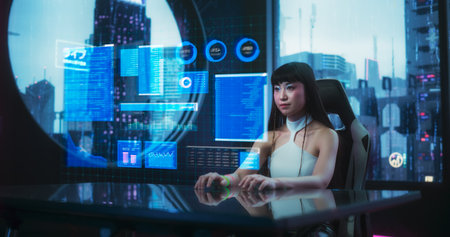 Stylish Japanese Young Woman Interacting with an Augmented Reality Hologram with Business Data,...