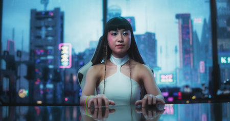 Stylish Japanese Young Woman Interacting with Augmented Reality Platform in a Technologically...