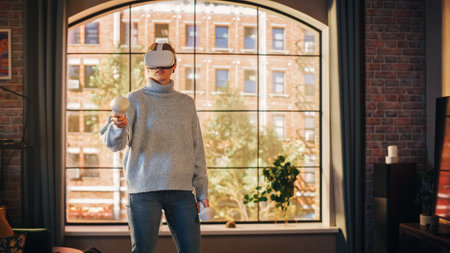 Young Female Gamer with Short Hair Having Fun and Playing Virtual Reality Game at Home in Her Living...