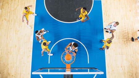 Basketball Tournament Final: Middle Of International Match With Basketballers Continuing Playing After Team Scored A Goal. Shot From Basketball Hoop Point Of View. Fansの写真素材