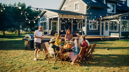 Group of Multiethnic Diverse People Having Fun, Communicating with Each Other and Eating at Outdoors...