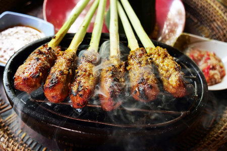 grilled chicken on hot charcoal grill, malaysian street foodの写真素材