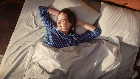 Top View Home: Beautiful Young Woman Sleeps Charmingly in Her Bed, When Sun Caresses Her She Opens...
