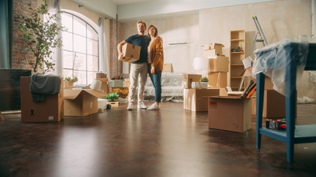 Family New Home Moving in: Happy and Excited Young Couple Enter Newly Purchased Apartment. Beautiful...