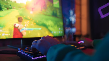 Gaming at Home: Gamer Playing Online Video Game on Computer. Professional Stylish Male Enjoying 3D...