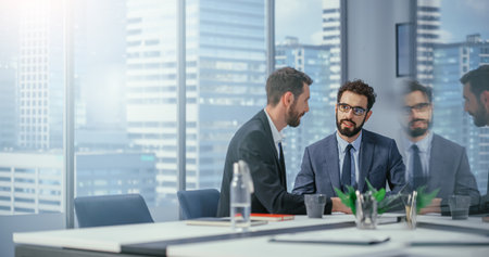 Businesspeople in Modern Office: Business Meeting of Two Businessmen Talking. CEO and Executive...