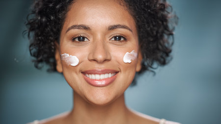 Female Beauty Portrait. Happy Black Multiethnic Brazilian Woman Posing On Camera. She is Using...